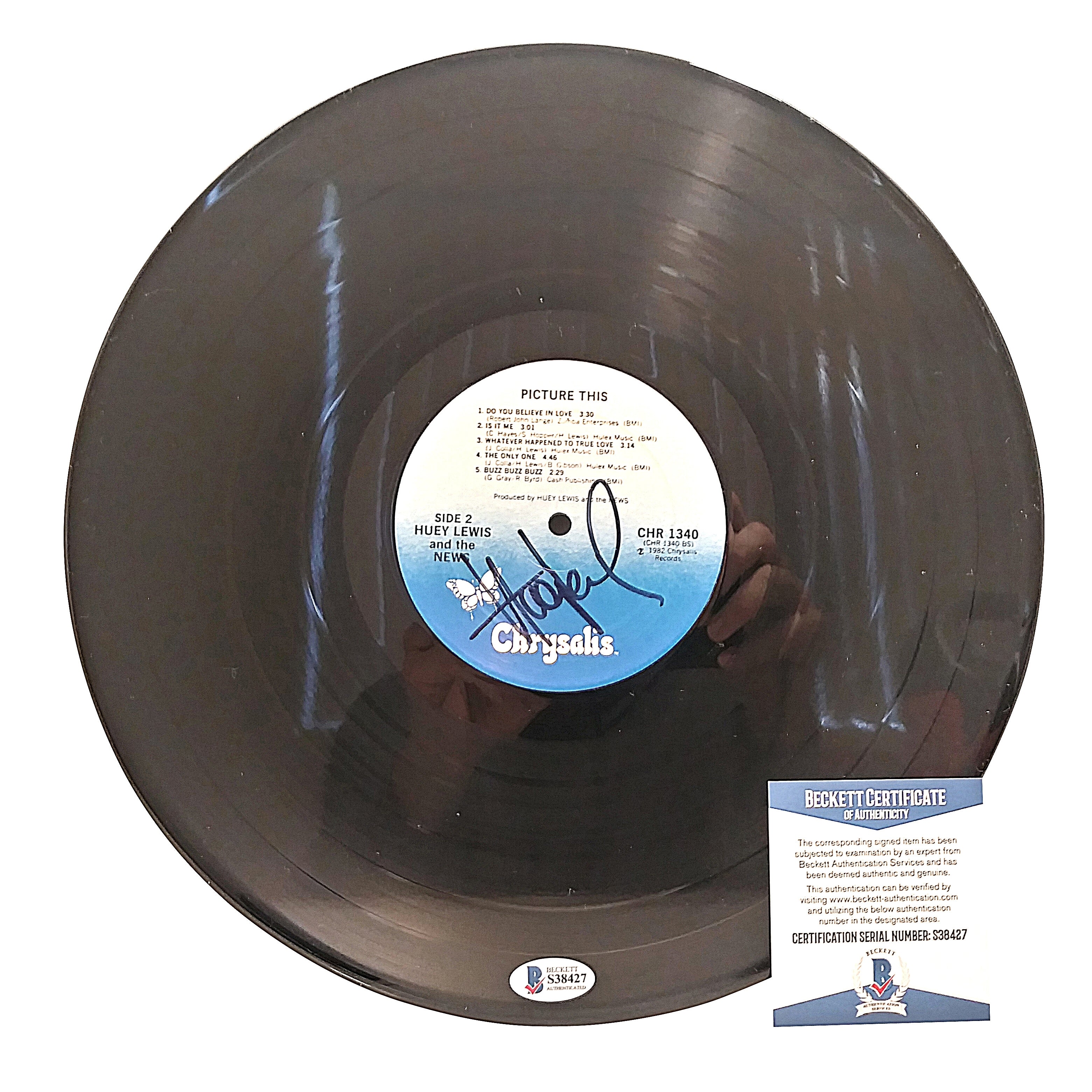 Huey Lewis Autographed Photo – Beckett BAS