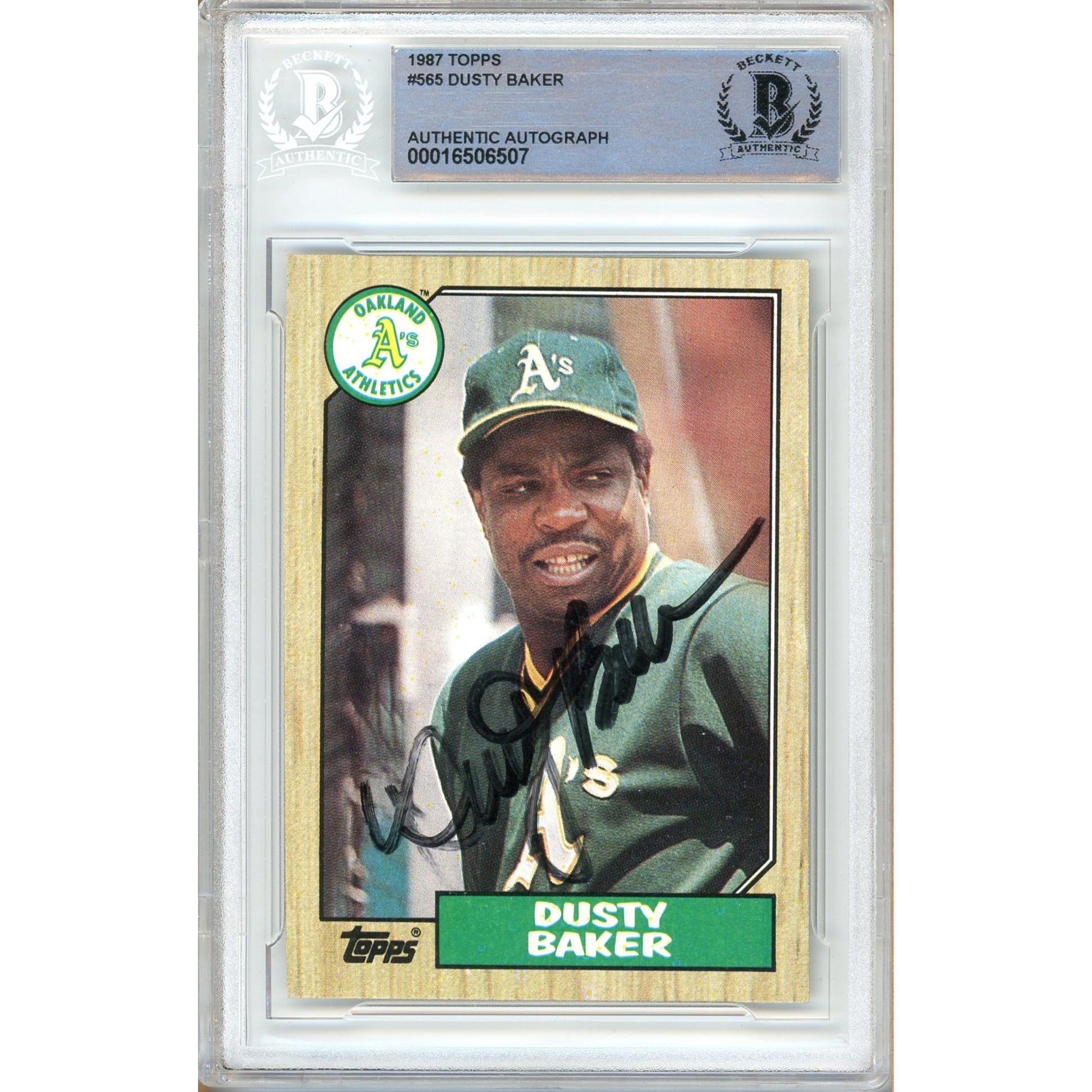 Baseball trading card of Dusty Baker with a green cap and Oakland Athletics logo, encased in a protective frame.