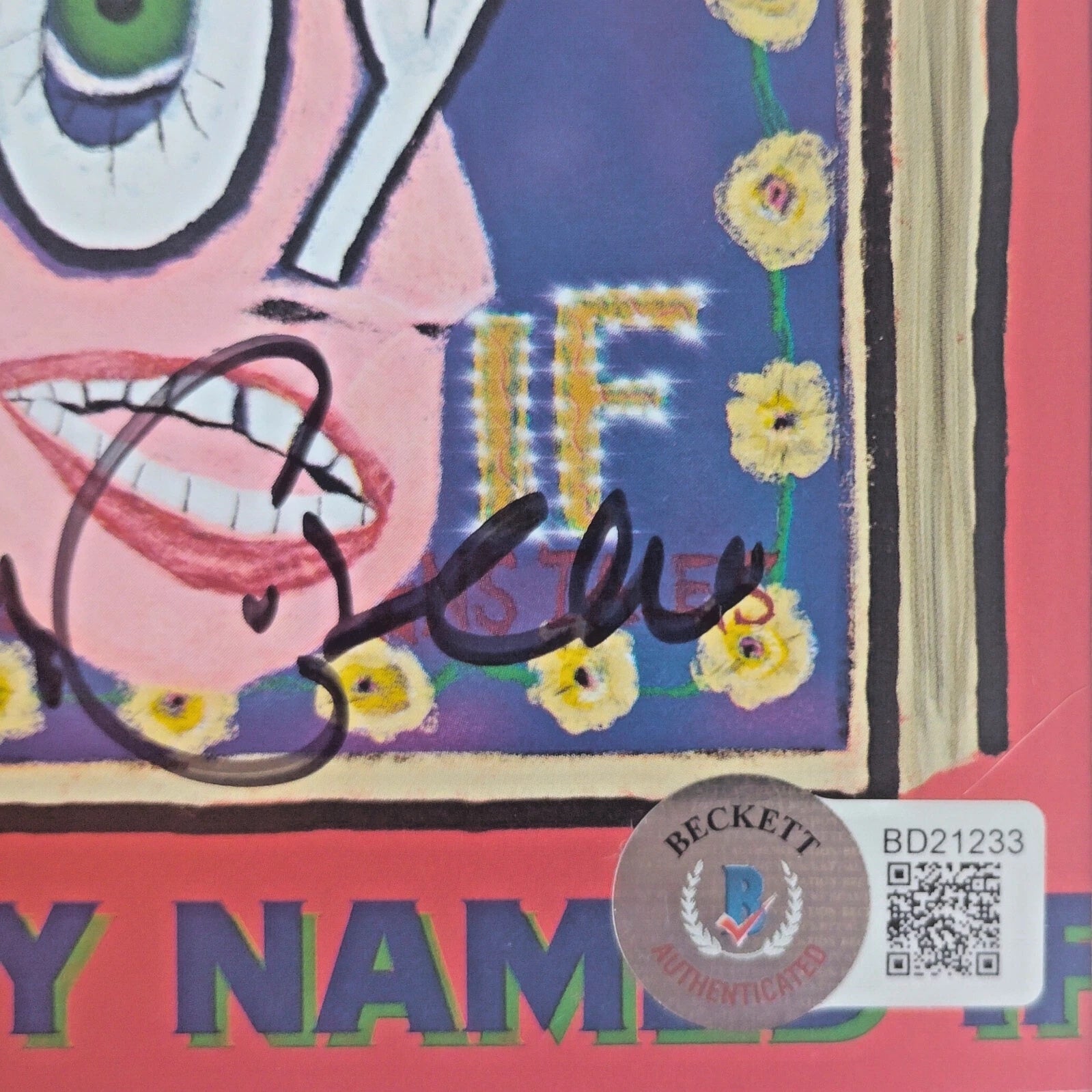 Elvis Costello auto photo – authentication sticker – Beckett COA