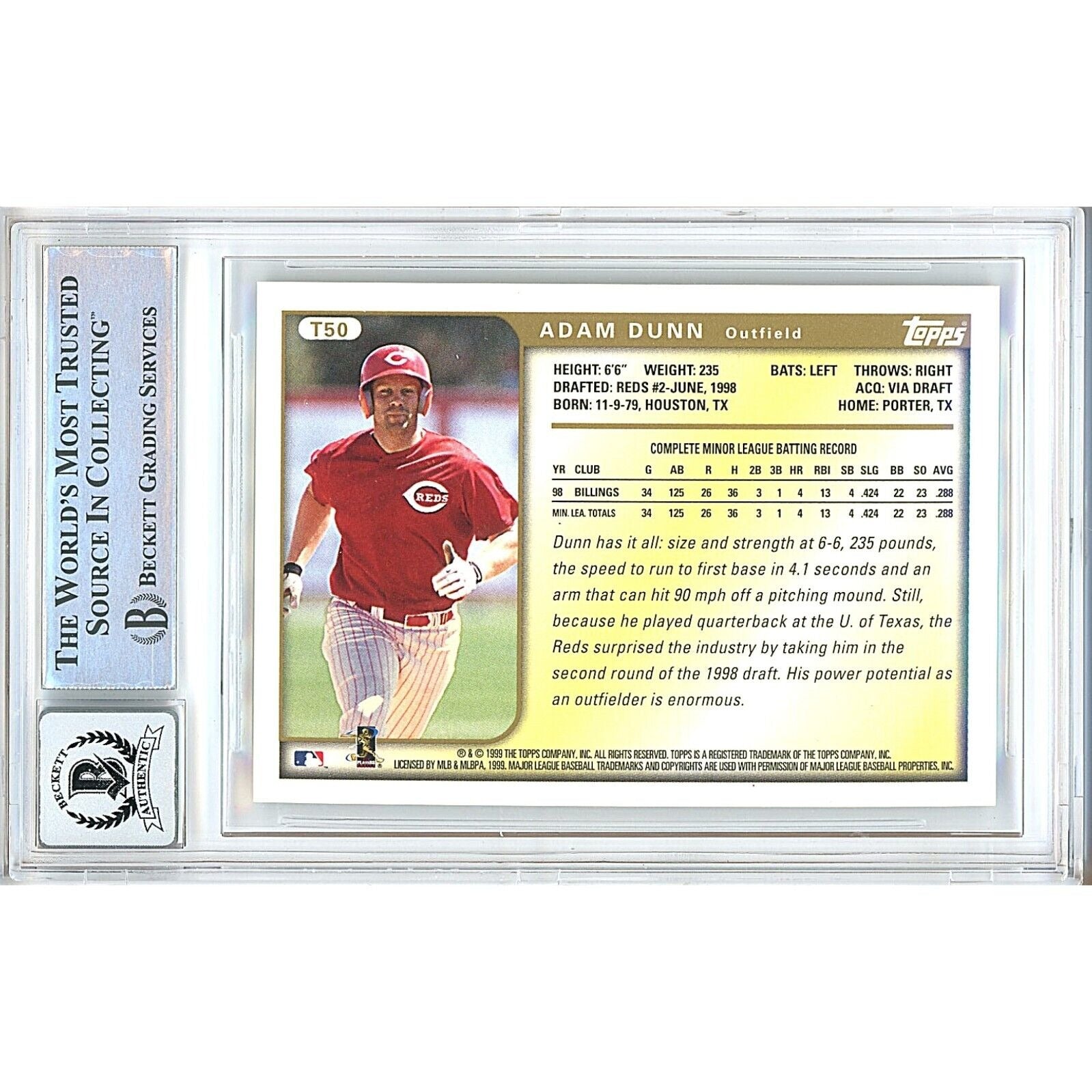 Baseball- Autographed- Adam Dunn Signed 1999 Topps Traded Baseball Card Cincinnati Reds Beckett Authentic Auto Slab Back