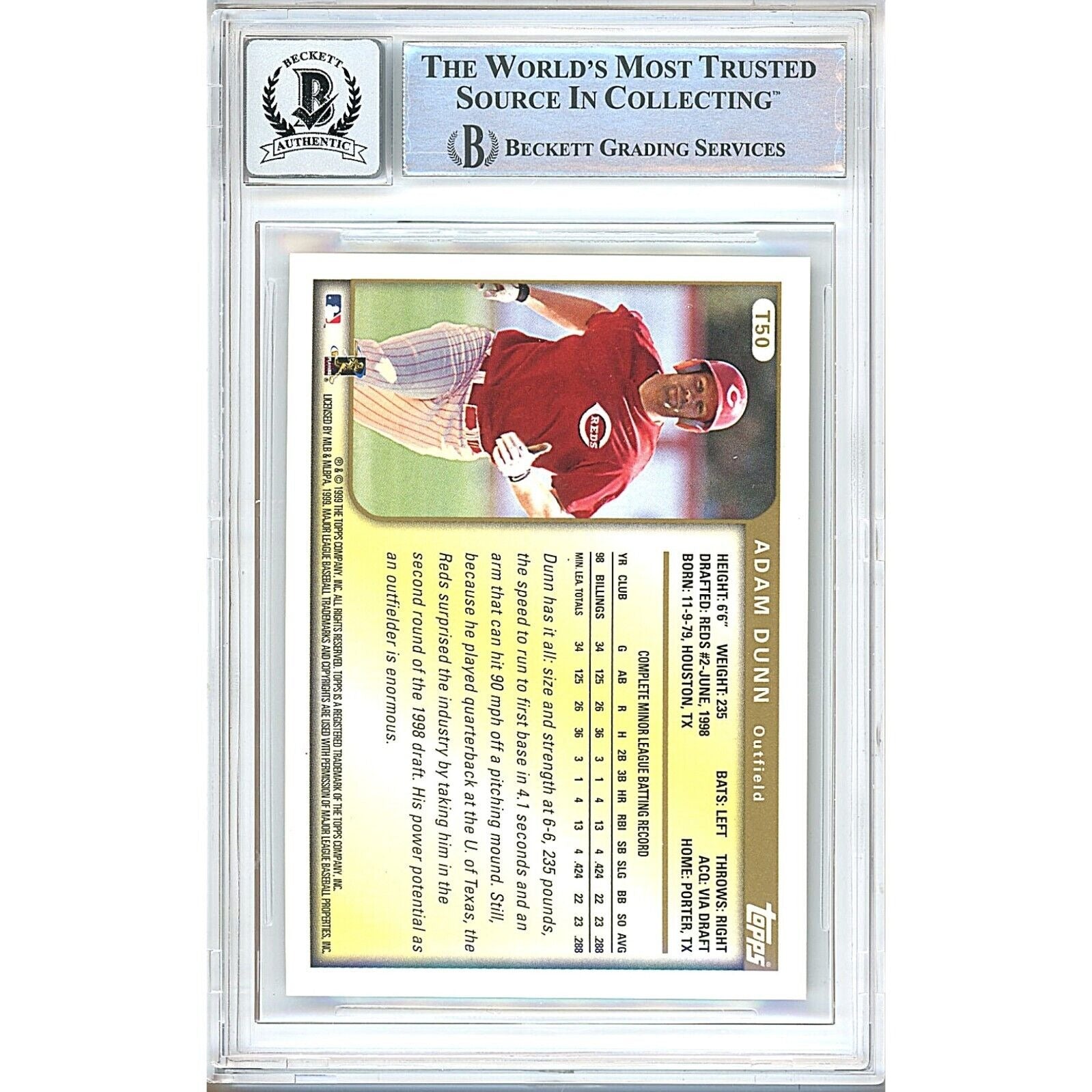 Baseball- Autographed- Adam Dunn Signed 1999 Topps Traded Baseball Card Cincinnati Reds Beckett Authenticated Auto Slab Back