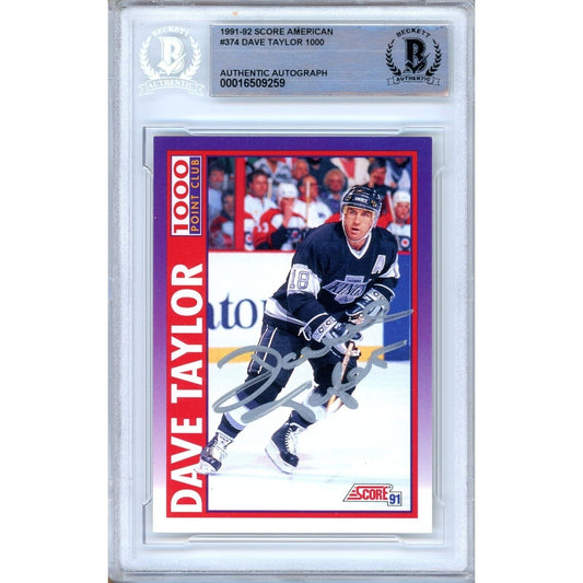 Hockey- Autographed- Dave Taylor Los Angeles Kings Signed 1991-92 Score American 1000 Point Club Hockey Card Beckett Authentic Auto Slab Front