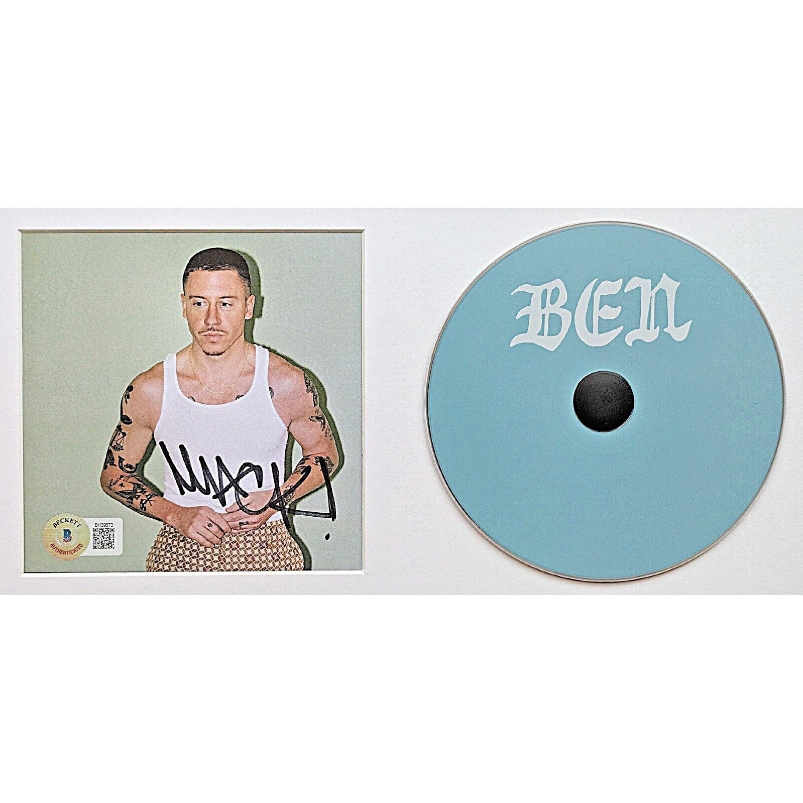 Macklemore cd autograph – angled display – Beckett COA
