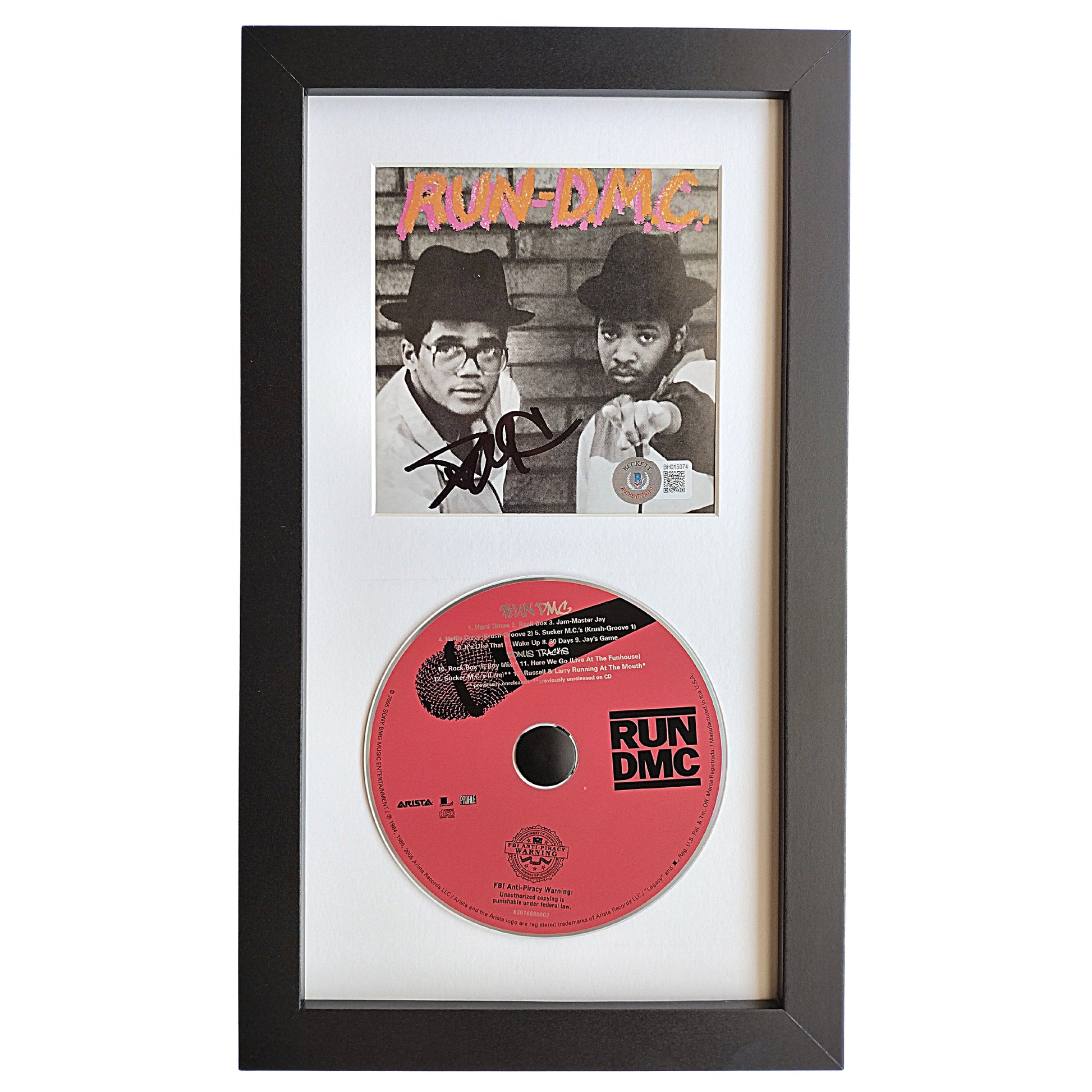darryl-mcdaniels-autographed-run-dmc-self-titled-cd-cover-framed-bas-BH015074-front of Frame 
