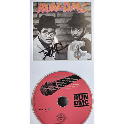darryl-mcdaniels-autographed-run-dmc-self-titled-cd-cover-framed-bas-BH015074-zoom-in-on-signature