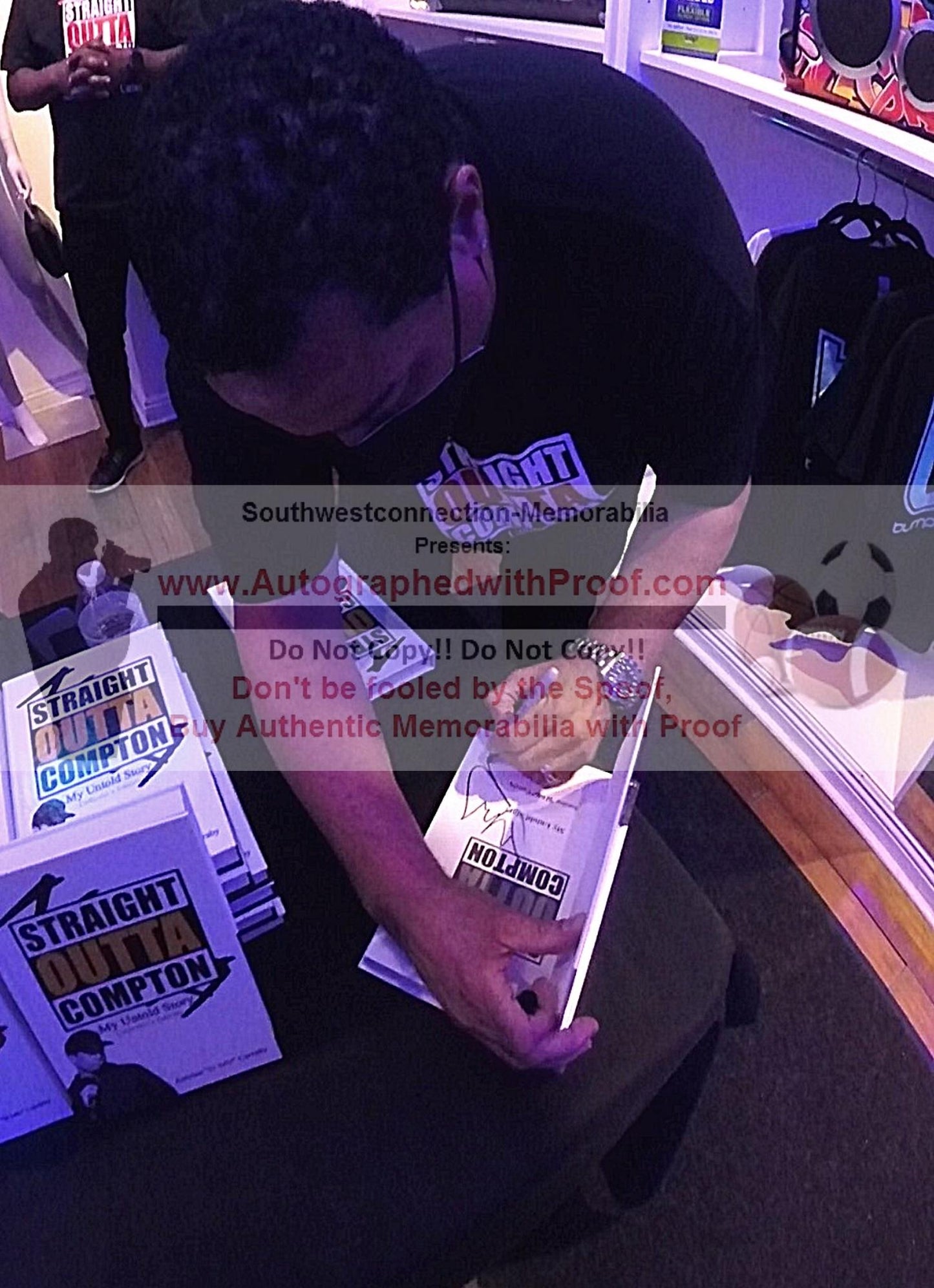 Music- Autographed- DJ Yella of NWA Signing Straight Outta Compton Hardcover 1st Edition Book Beckett Authentic Auto COA Front