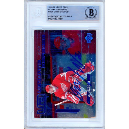 Hockey- Autographed- Chris Osgood Detroit Red Wings Signed 1999-2000 Upper Deck Ultimate Defense Hockey Card Beckett Authenticated Auto Slab Front