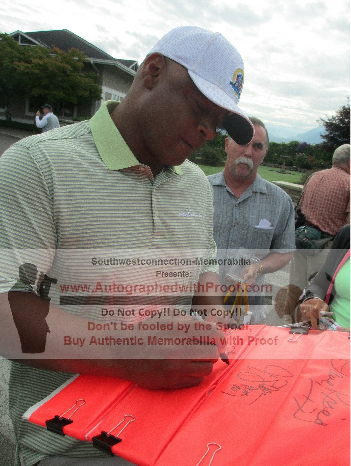 Football End Zone Pylons-Autographed - Warren Moon Signing Seattle Seahawks Football Pylon, Proof