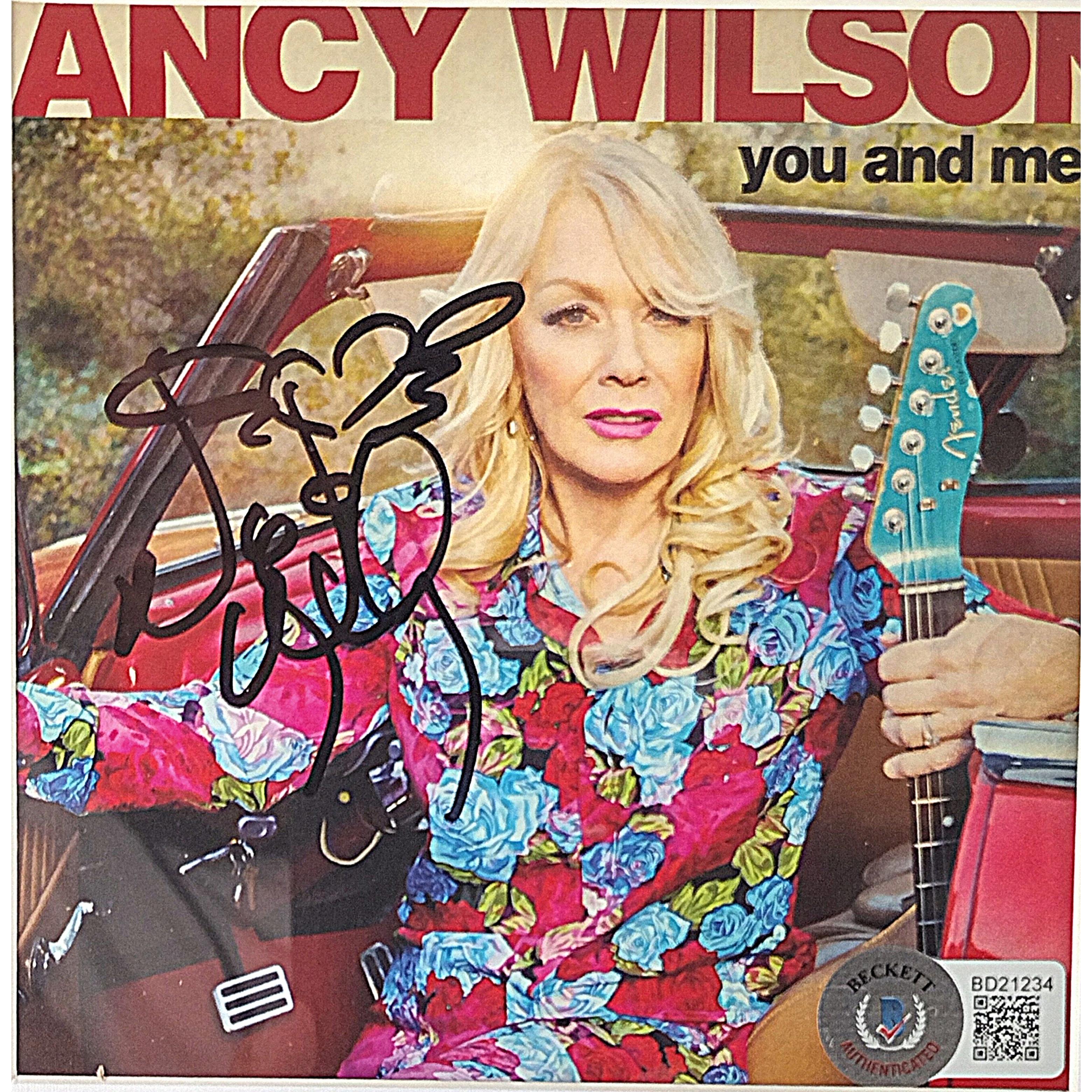 Nancy Wilson auto football – authentication sticker – Beckett COA